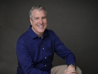 Confident-smile-in-a-navy-shirt